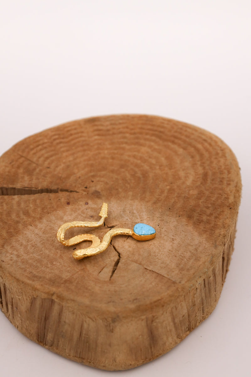 Gold snake hat pin with turquoise as a head