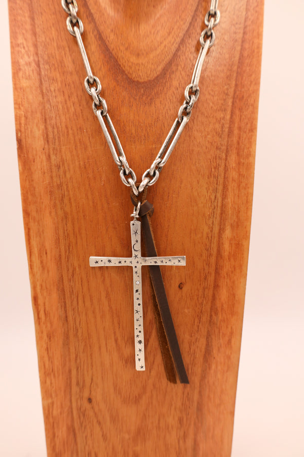 Sterling silver handmade melissa chain with handmade celestial cross. Includes 3 natural diamonds and real leather attachment.