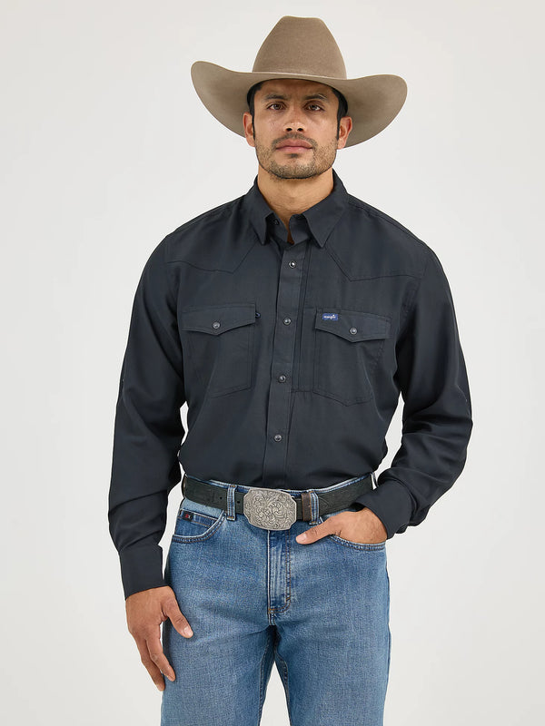 Man wearing a black shirt, blue jeans, and a brown cowboy hat on a white background
