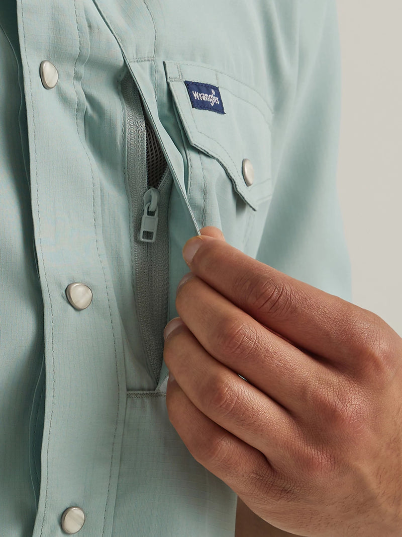 Man wearing performance short sleeve shirt with button front and vents in the back