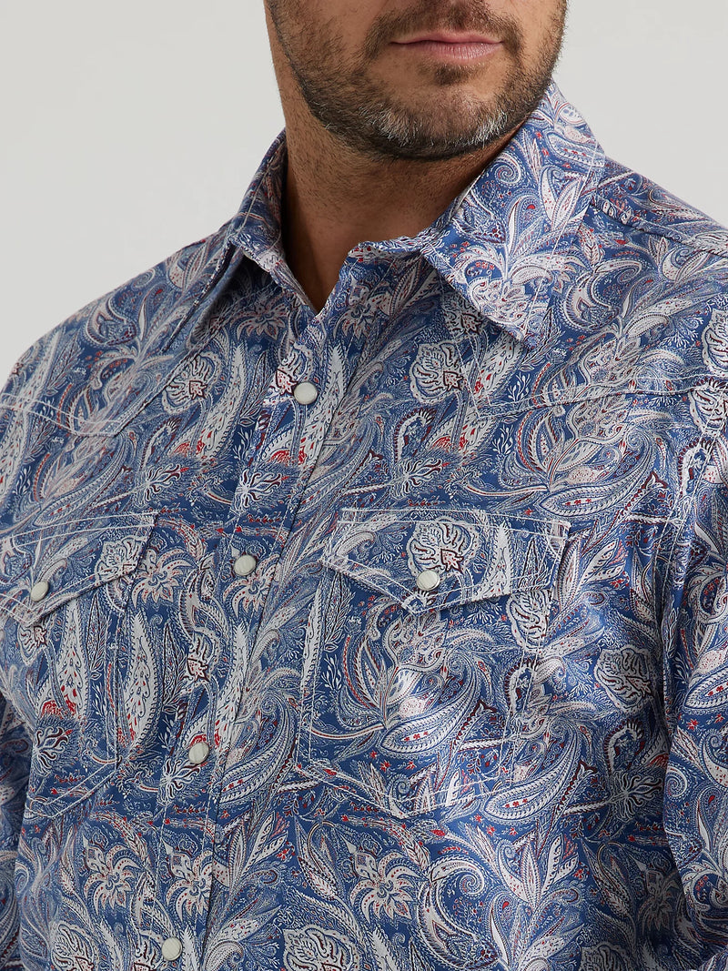MAN WEARING BLUE LONG SLEEVE BUTTON FRONT SHIRT WITH PAISLEY PRINT