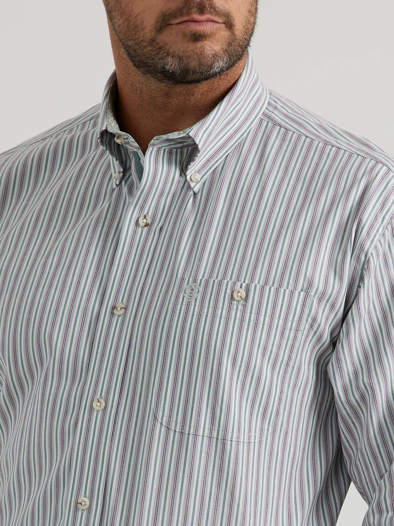 MAN WEARING LONG SLEEVE BUTTON FRONT SHIRT WITH GEO PATTERN IN A STRIPE FORMATION