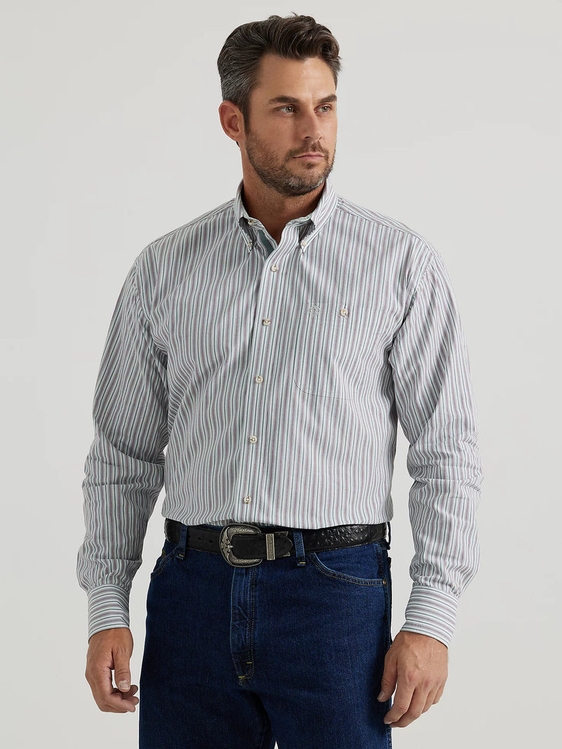 MAN WEARING LONG SLEEVE BUTTON FRONT SHIRT WITH GEO PATTERN IN A STRIPE FORMATION