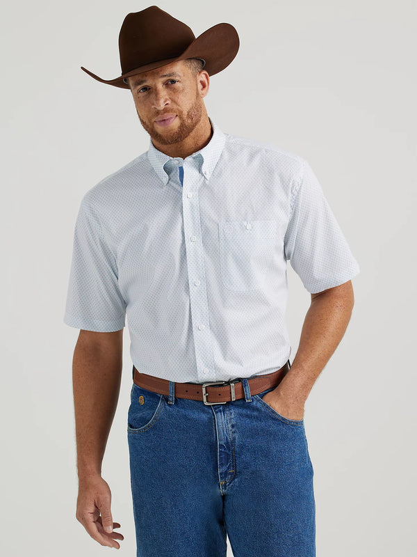 Man wearing short sleeve button down shirt in white and blue