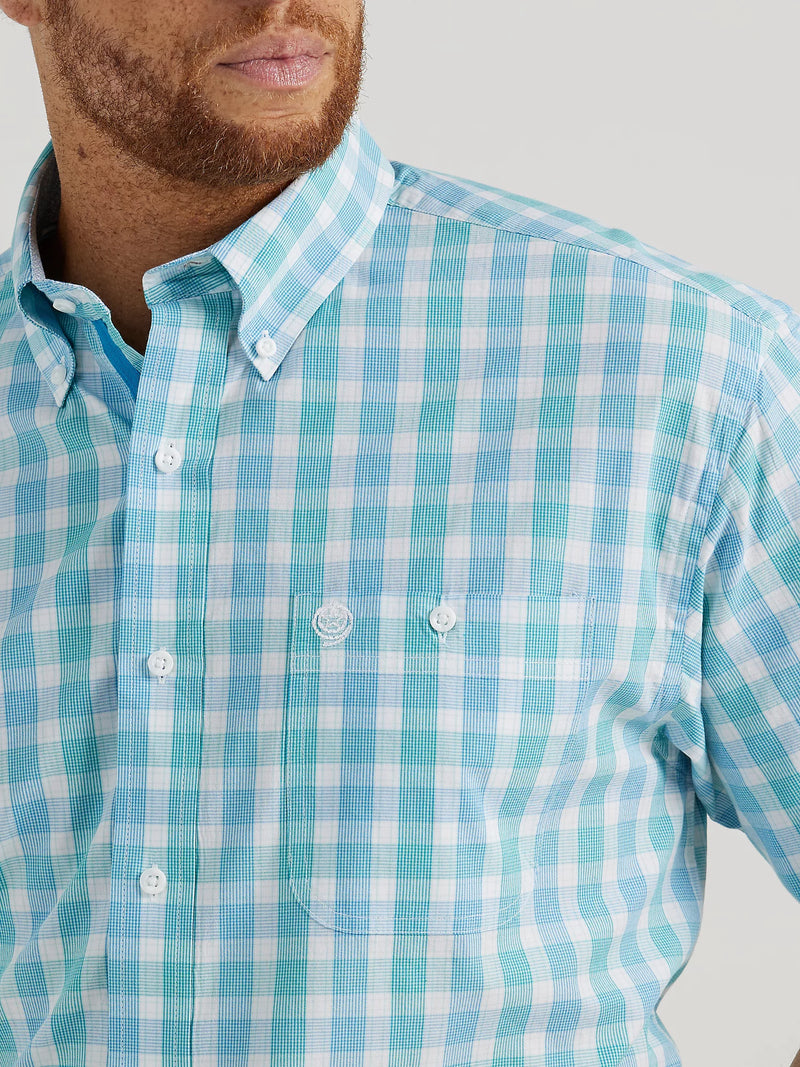Man wearing white and blue plaid short sleeve button down shirt