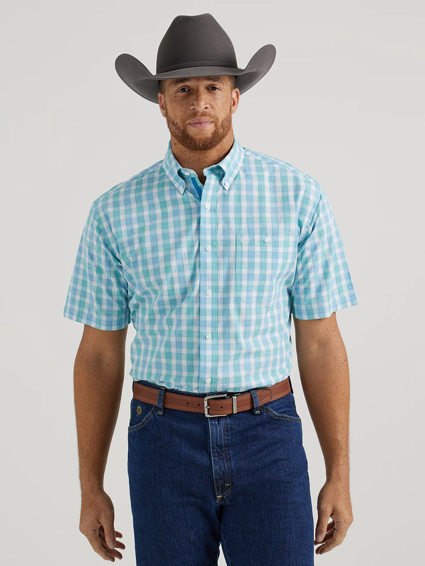 Man wearing white and blue plaid short sleeve button down shirt 