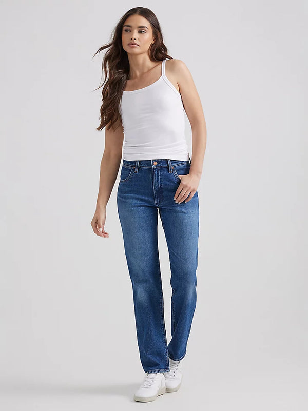 Woman wearing midrise straight jeans in a dark wash