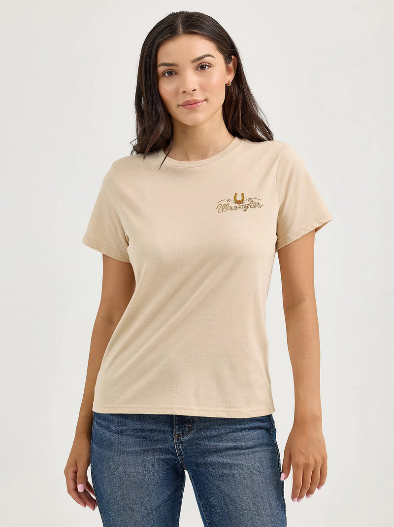 Woman wearing a beige t-shirt with a logo on a white background