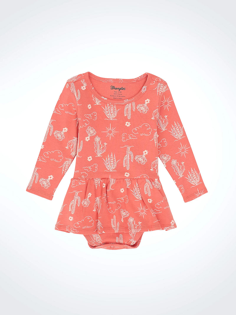 Coral dress with white patterns on a white background