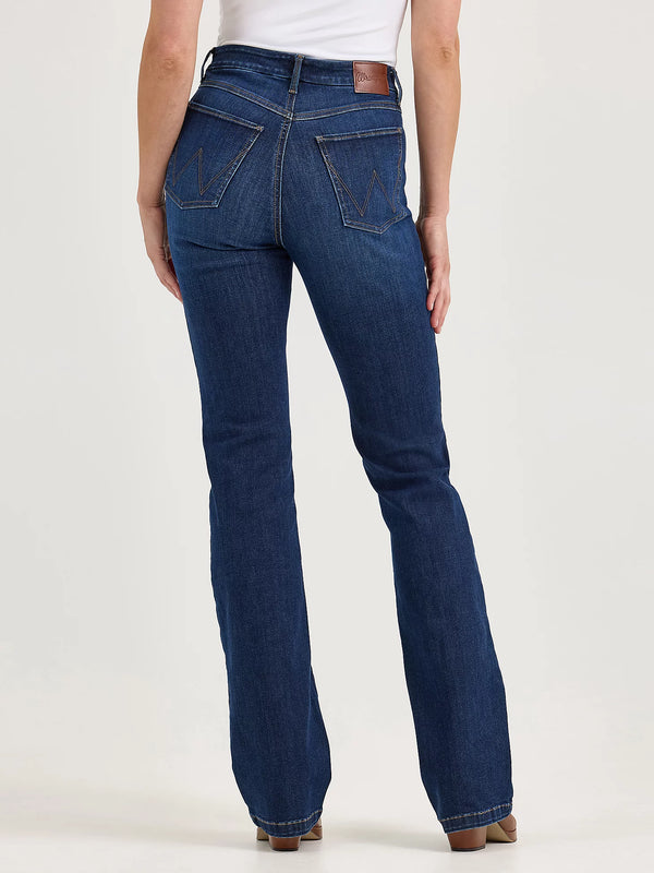 Blue jeans worn by a person on a white background