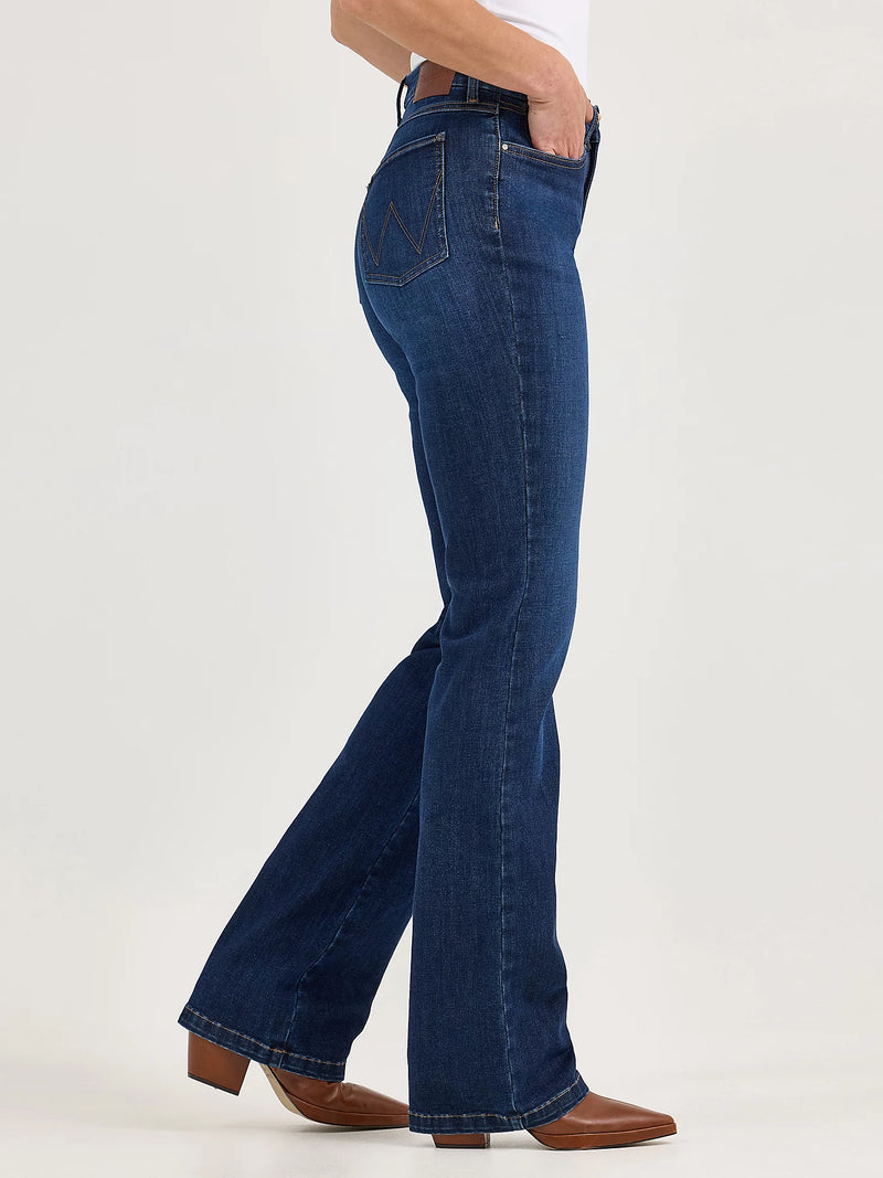 Blue jeans worn by a person on a white background