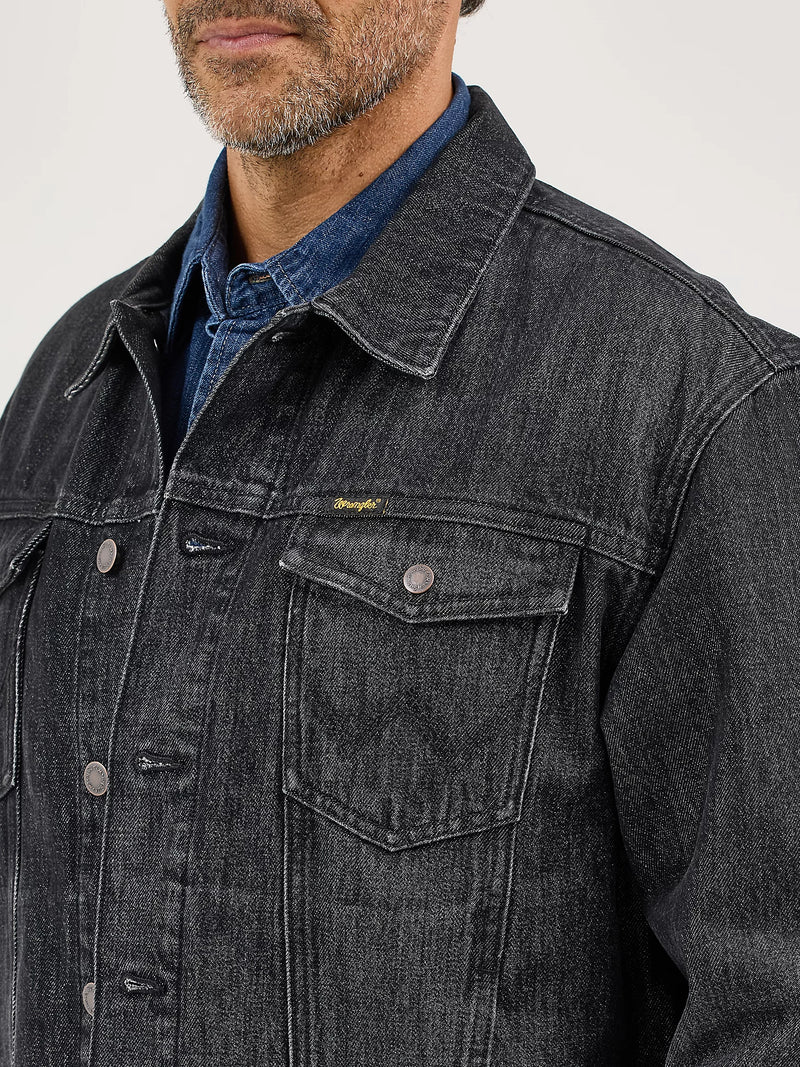 Black denim jacket with a brand logo on a white background