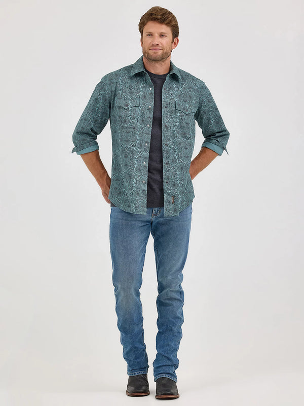 Man wearing a denim shirt and jeans on a white background