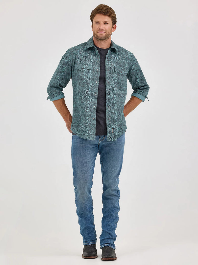 Man wearing a denim shirt and jeans on a white background