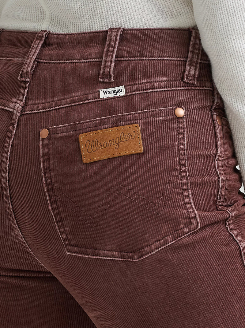 Brown corduroy pants with Wrangler logo on pocket and label.