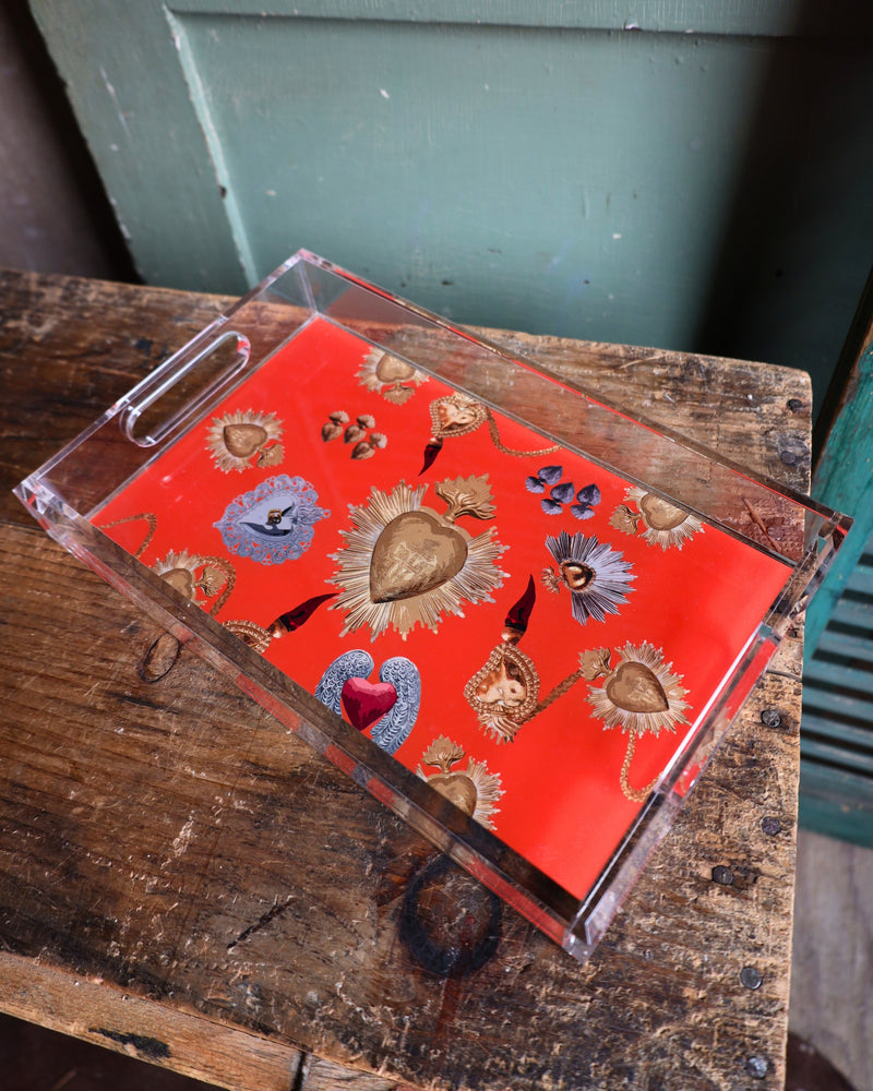 Acrylic tray with orange background and hearts all over