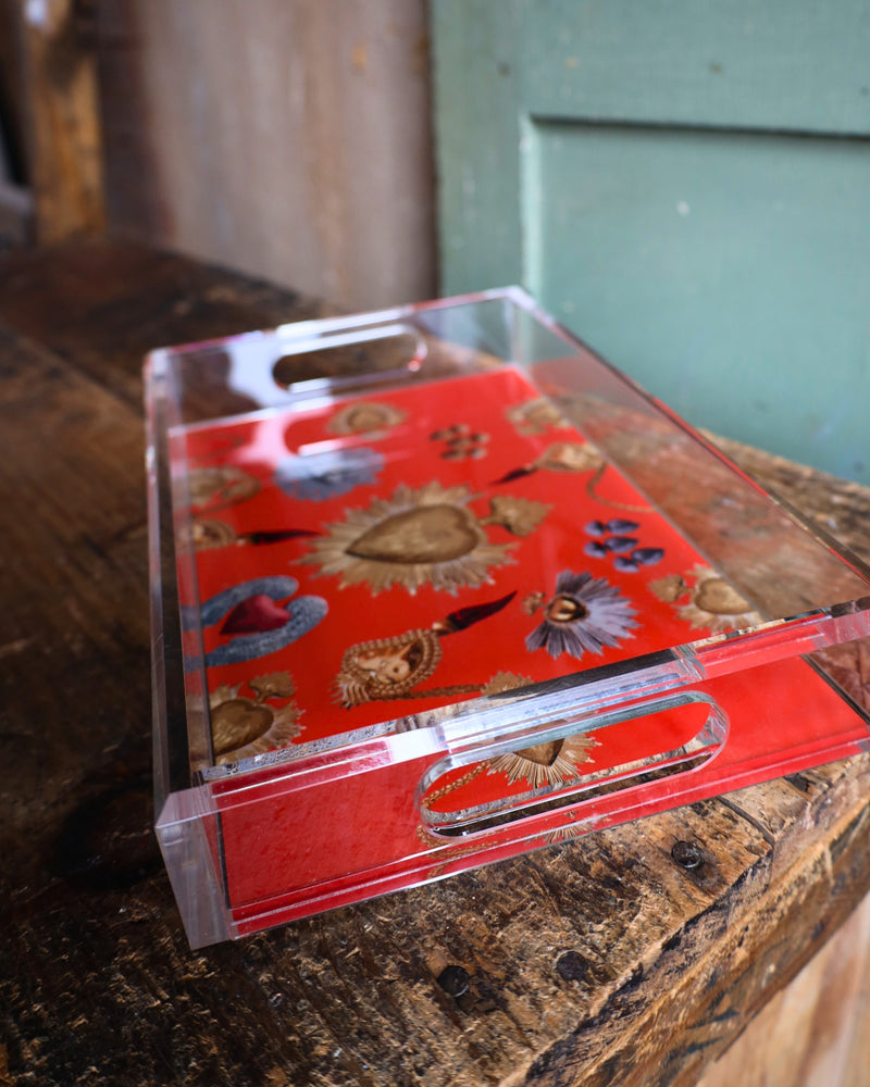 Acrylic tray with orange background and hearts all over