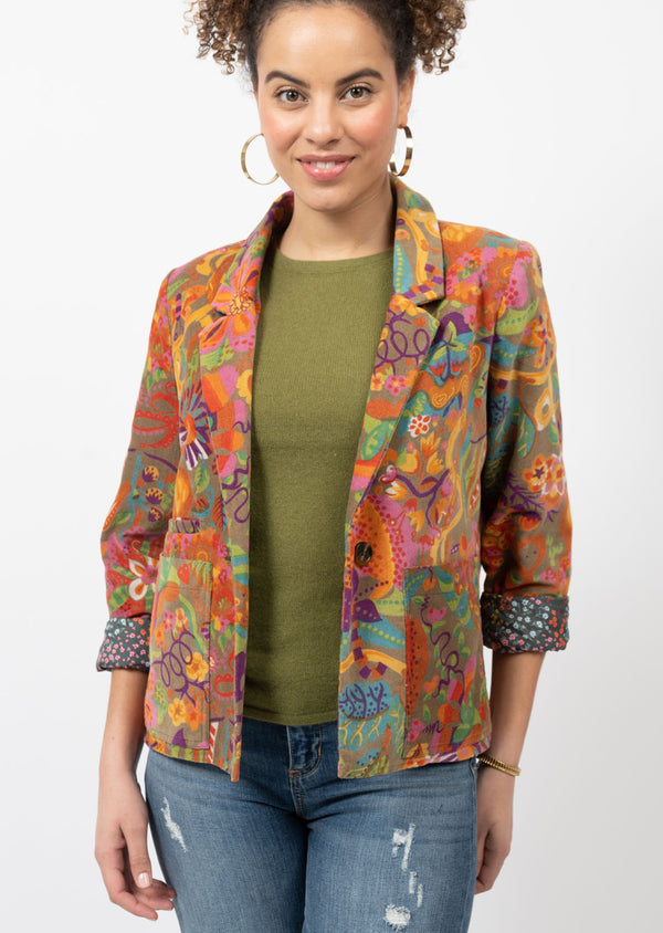 Woman wearing floral print blazer