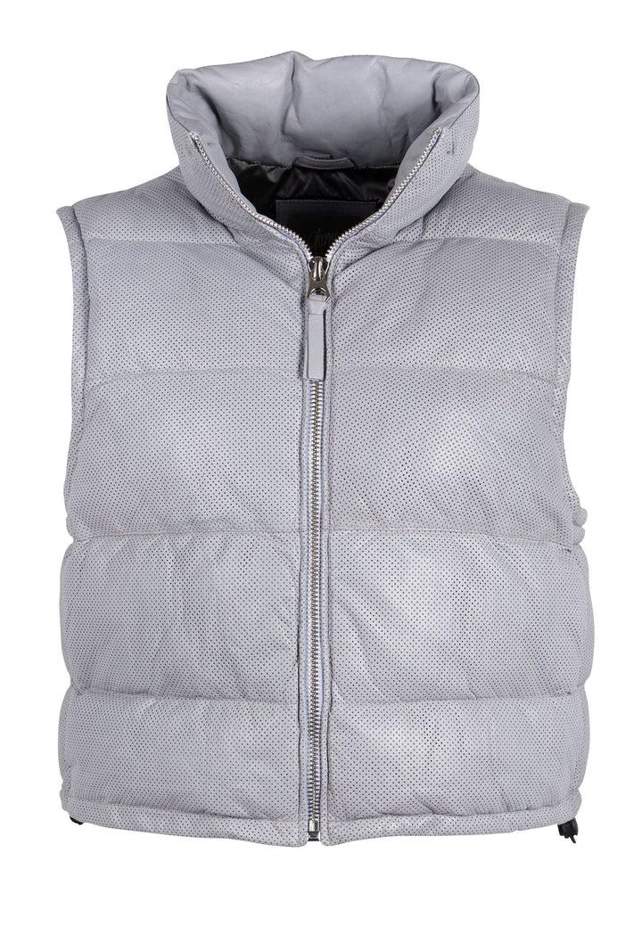 Woman wearing leather puffer vest with side pocket entry 