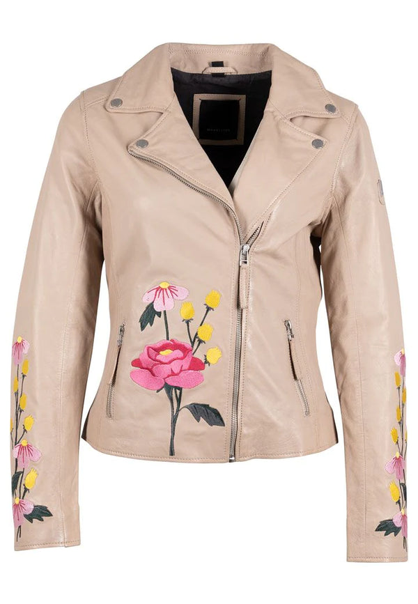 Woman wearing beige leather jacket with pink floral embroidery with asymmetrical zipper on the front