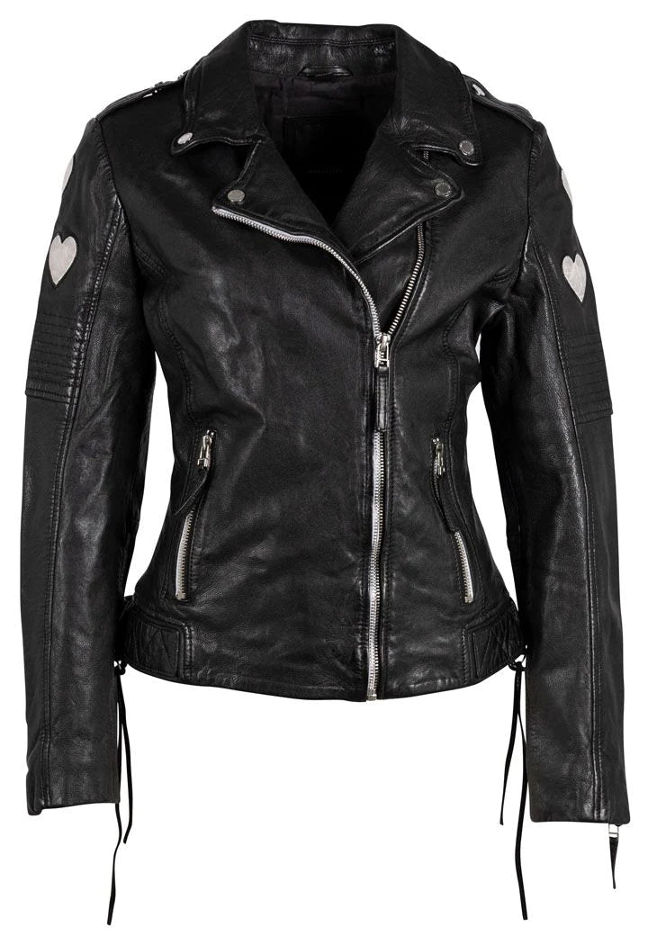 Woman wearing black leather jacket with white hearts with asymmetrical zipper on the front