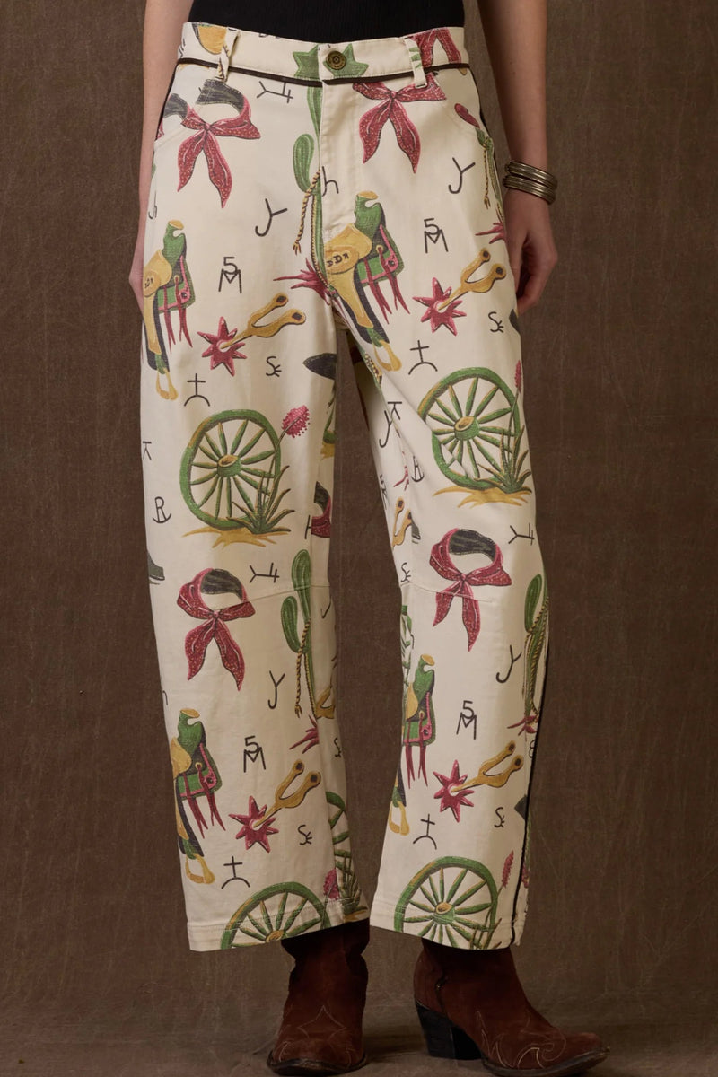 Colorful patterned pants with a brown background