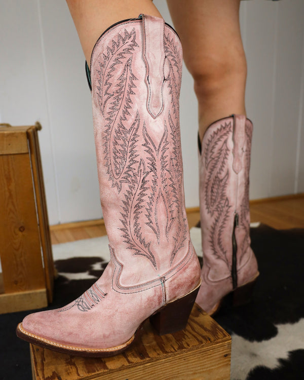 A model's wearing a pair of CORRAL WOMEN'S ROSE BOOT