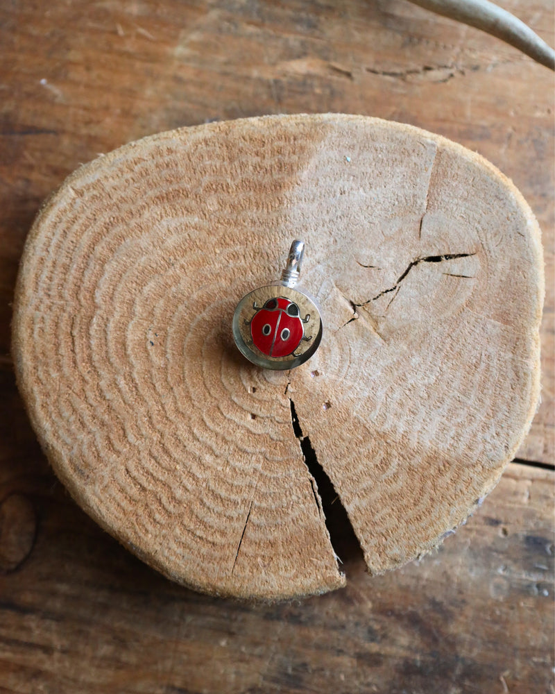 COREEN CORDOVA LADY BUG PENDANT