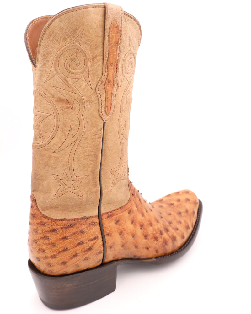 Tan ostrich cowboy boot with tan shaft with star in the center of the front and back shaft