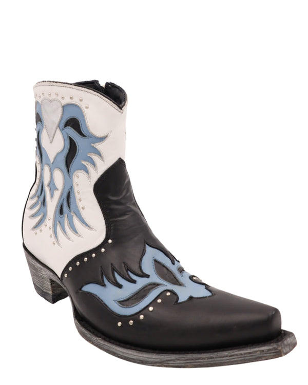 Boot featuring sassy overlay flame design, contrast leather trim, studding throughout, and that subtle metallic heart stitched on the top of the shaft