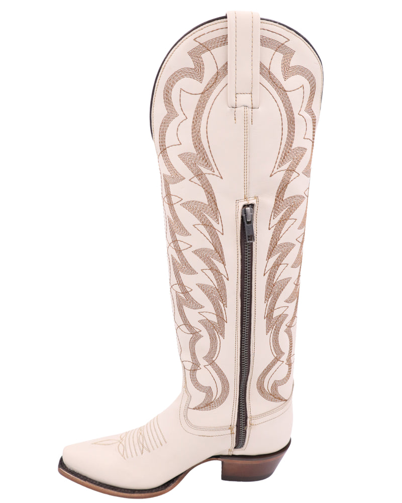 Women's cowgirl boot in a bone leather color and brown stitching on the shaft and vamp