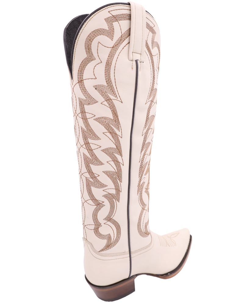 Women's cowgirl boot in a bone leather color and brown stitching on the shaft and vamp