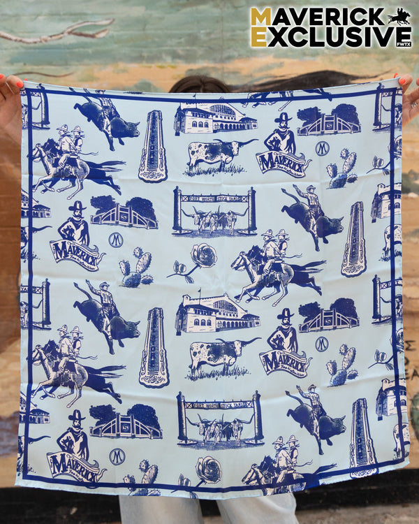 Person holding a blue and white patterned bandana with cowboy graphics and 'Maverick' branding.