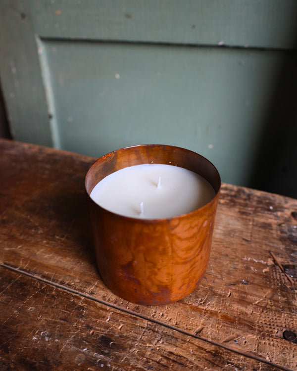 Candle in copper tin