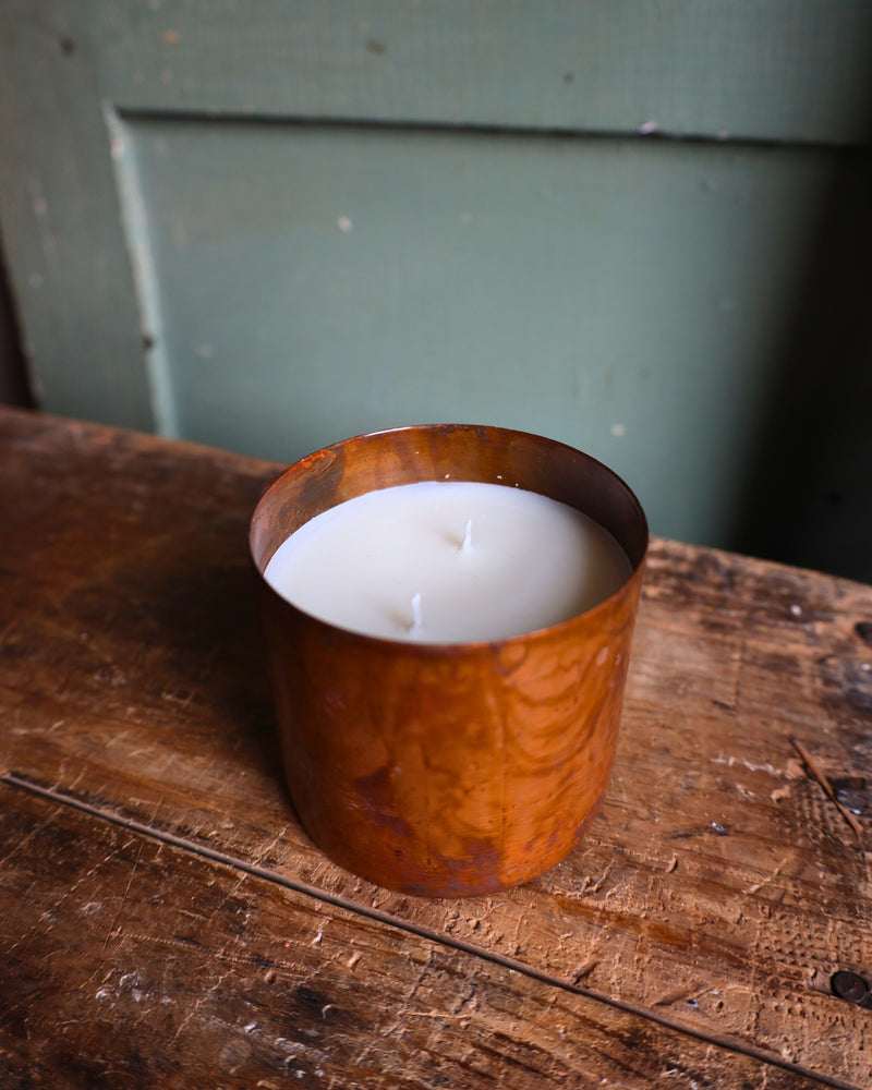 Candle in copper tin