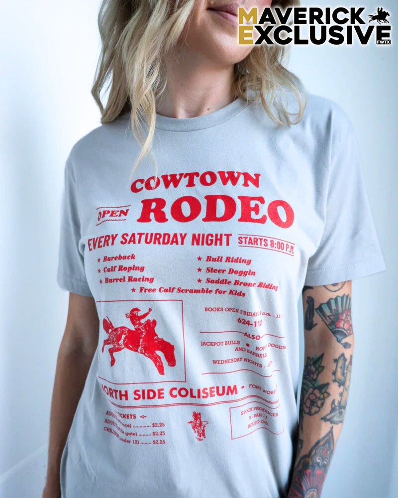 Person wearing a t-shirt with 'Cowtown Rodeo' text and graphics on a white background