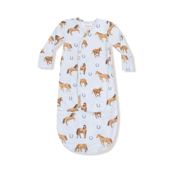 Baby onesie with horse pattern on a white background