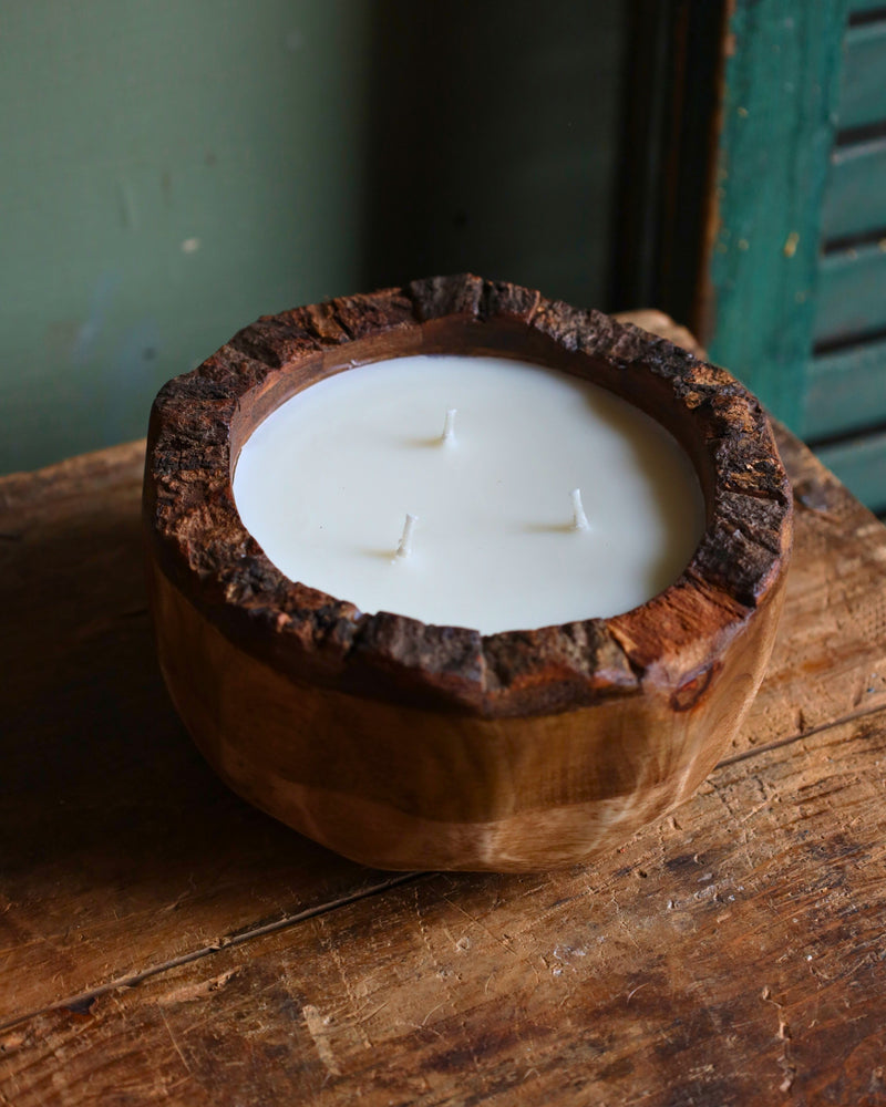 Candle in mango wood bowl