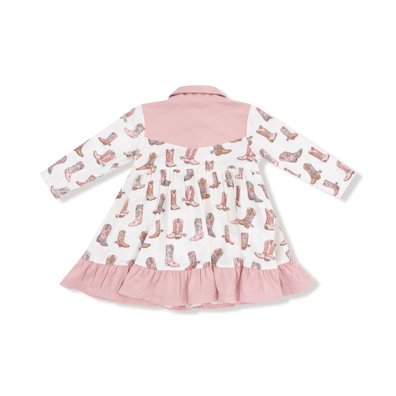 Children's dress with pink collar and ruffled hem, featuring a pattern of cowboy boots on a white background.