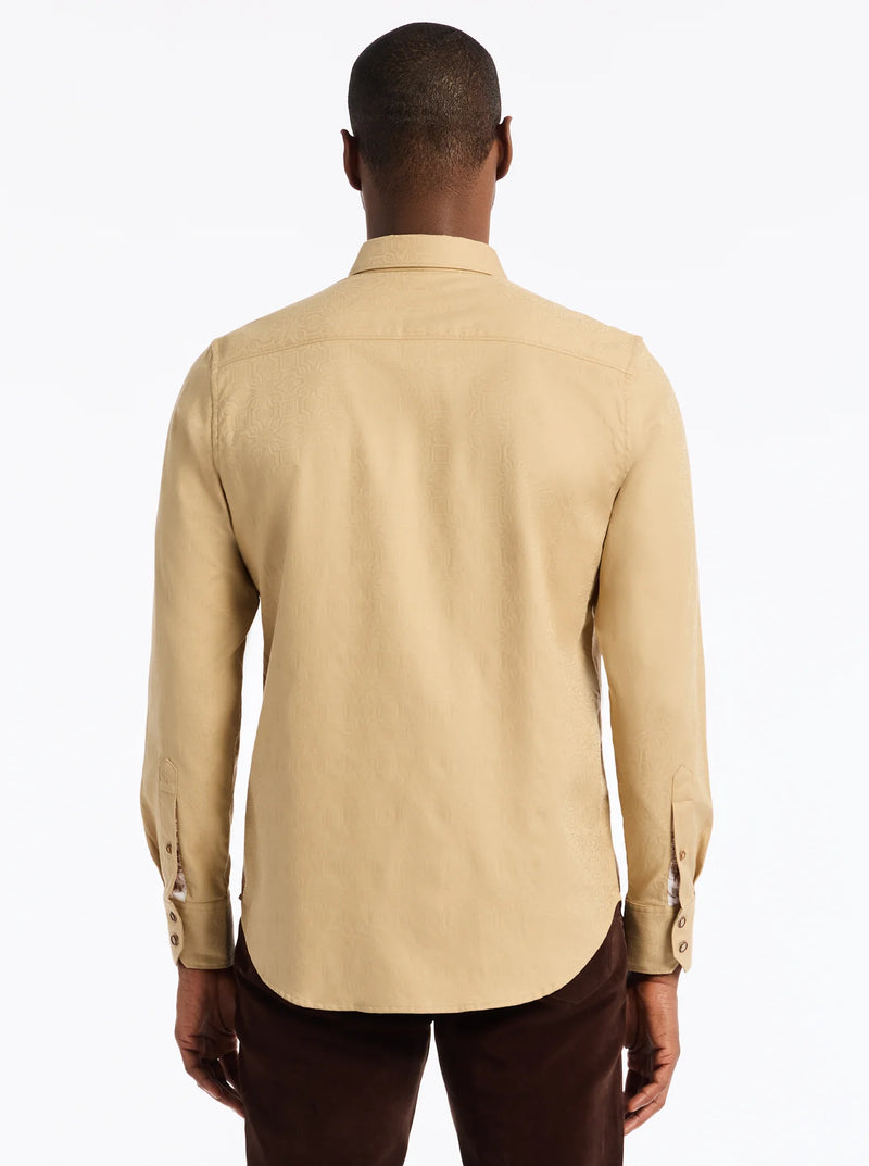 Man wearing a beige shirt from behind on a white background