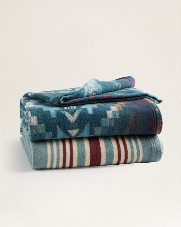 Aztec and stripe blanket set in blue and red colorways 