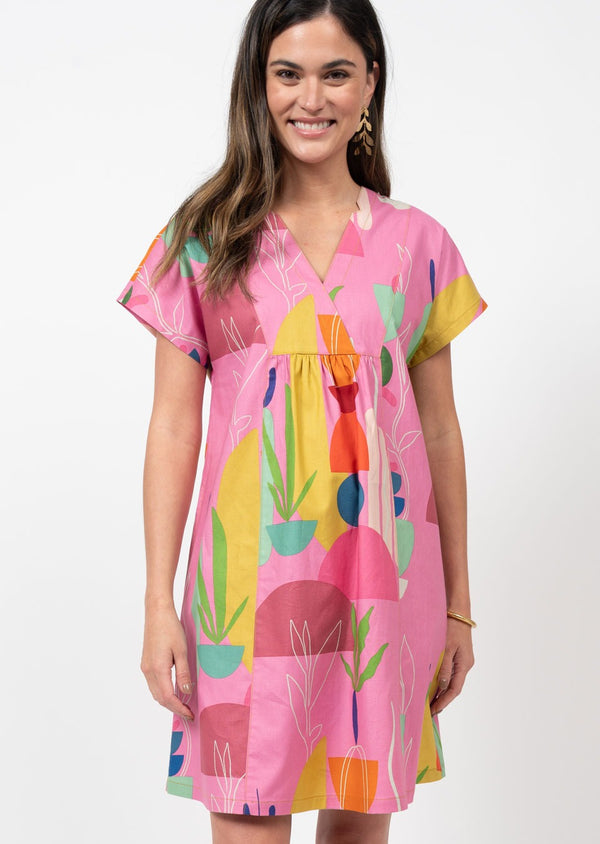 Short sleeve pink dress with abstract shapes in multicolors