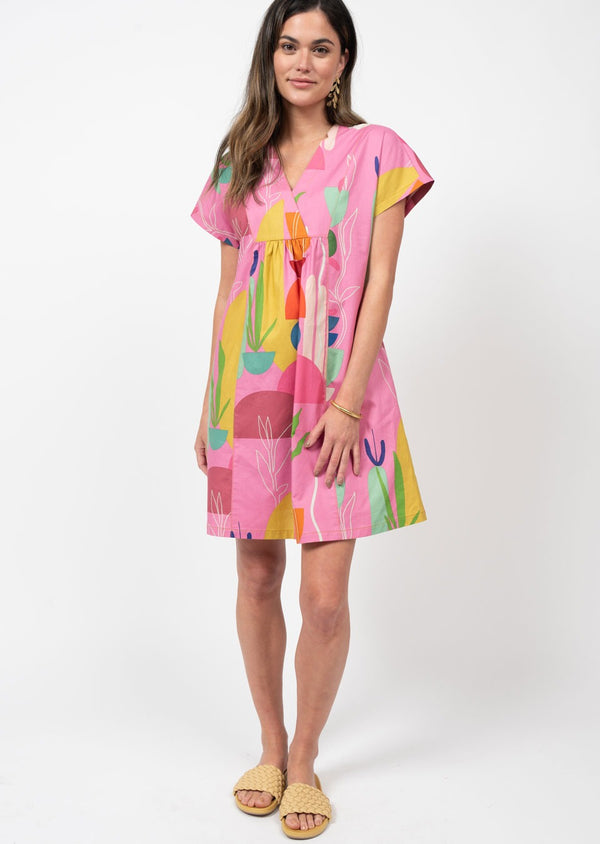 Short sleeve pink dress with abstract shapes in multicolors