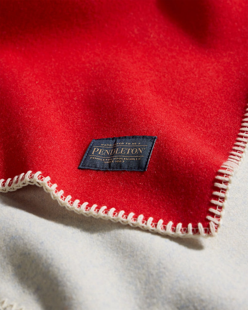 Red blanket with Pendleton label on a white background