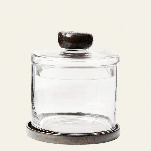 Glass canister with lid topped with a sculptural wax cast representation of the tahona