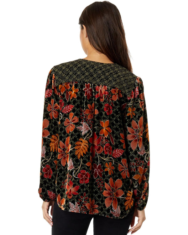 Vibrant velvet floral top features a split neckline with self-tie detail and long balloon sleeves.