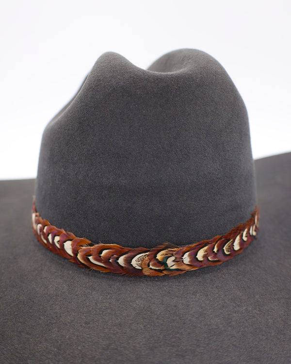 Pheasant feather hat band with leather ties in the back
