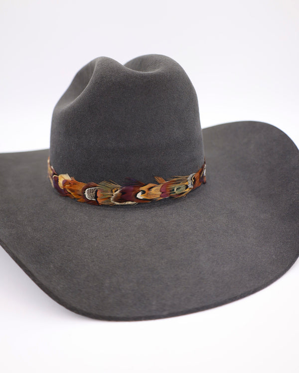 Pheasant feathers hat band with leather ties in the back