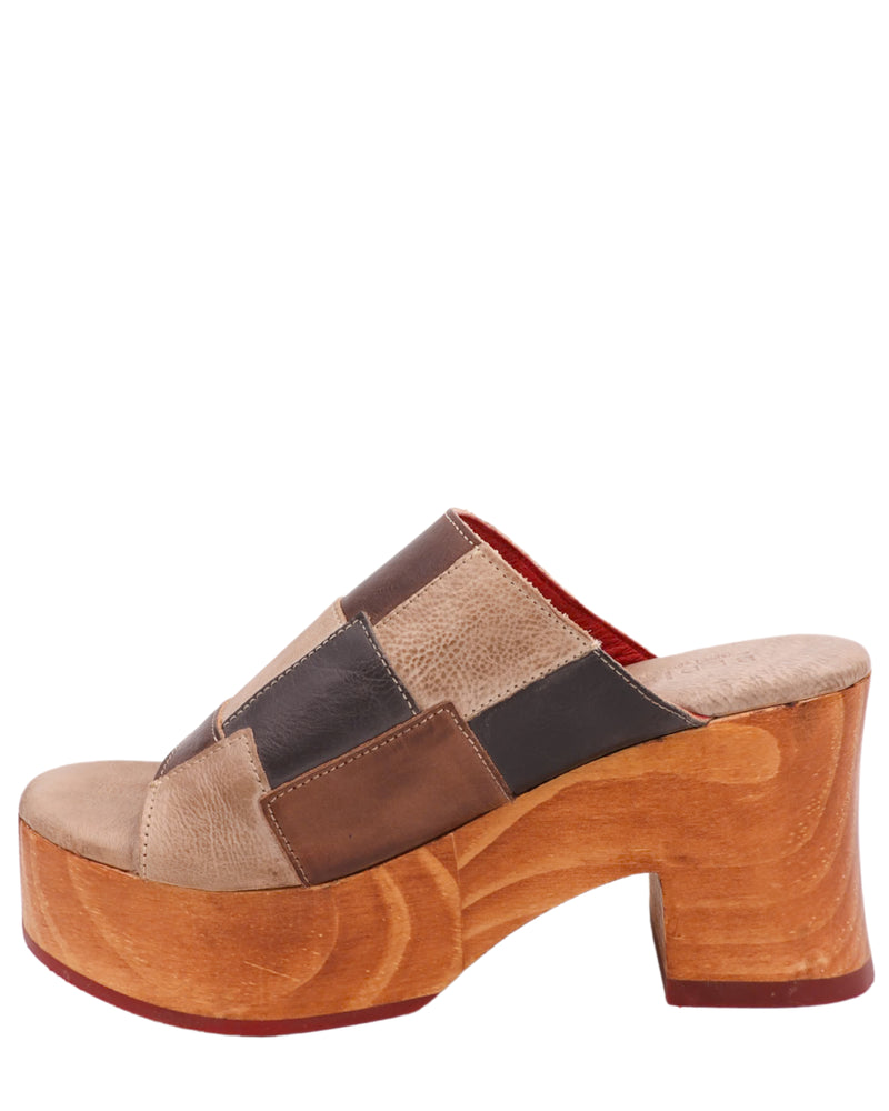 Wooden heel sandal with leather upper in a square patch pattern and peep toe