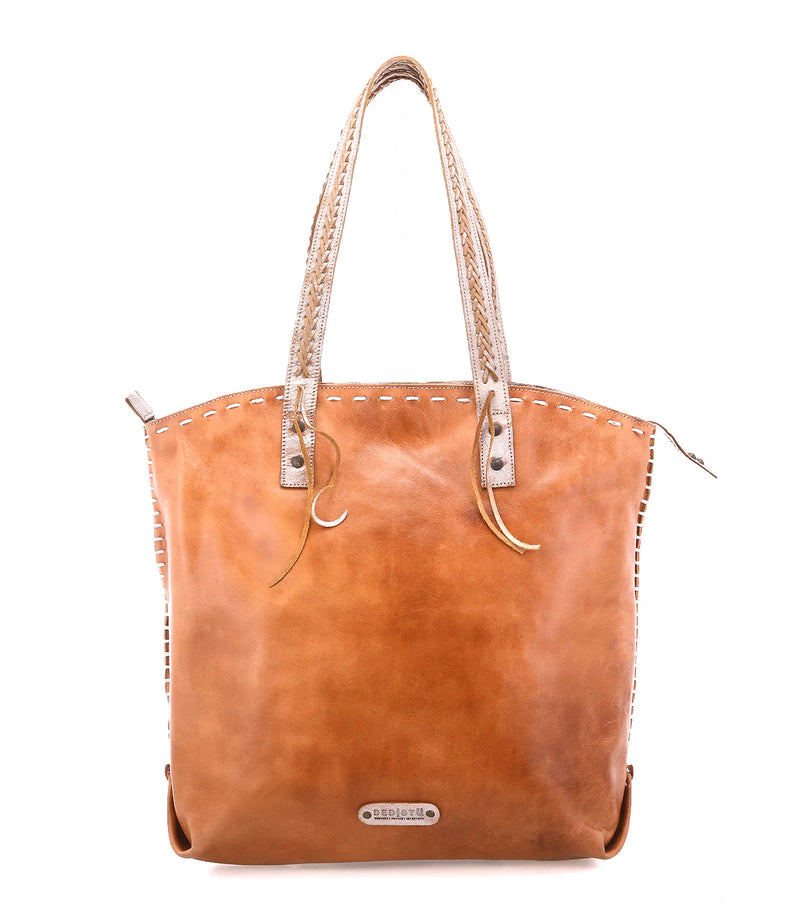 Brown leather tote bag with woven handles on a white background